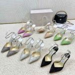 women's heeled sandals with floral embellishments.