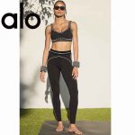 Alo Airlift high‑waist leggings and V‑front bra set in black for yoga and activewear