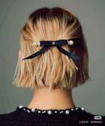 Elegant Chanel-style black and white bow hair clips with pearl accents – luxury hair accessories for women