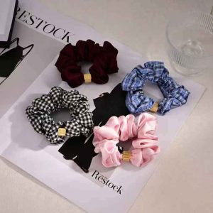 Three-piece Chanel-style hair bow clip set Luxury hair clips in black and white with logo detailing