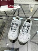 Stylish Gucci sneakers for men this Gucci silver reflective sneakers – designer shoes with bold look