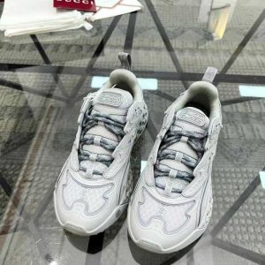 Stylish Gucci sneakers for men this Gucci silver reflective sneakers – designer shoes with bold look