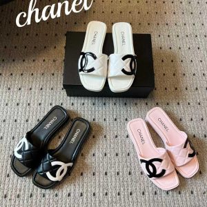 Collection of Chanel CC Slides in white, black, and pink, showcasing iconic designer flat mules with the signature interlocking CC logo.