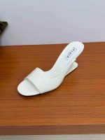 ALAÏA High-Shine Patent Slide Sandals – Black & White - Image 2