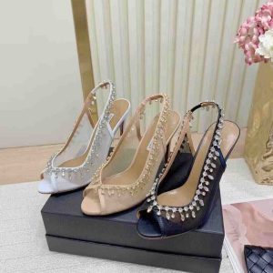 Three pairs of crystal-embellished mesh peep-toe slingback heels in white, nude, and black