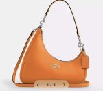 Chic Coach Hobo Bags – Elegant Leather Handbags in Bold Colors and Classic Prints - Image 2