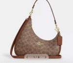 hobo Coach bags in orange and brown with leather accents"