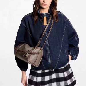 Versatile denim bomber jacket styled as effortlessly cool everyday outerwear