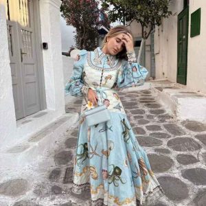 Blue vintage maxi dress with full sleeves maxi dress and ocean-inspired sea shell and octopus prints.