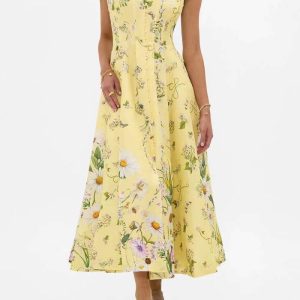 Charming yellow floral midi dress with strappy sleeves and summer vibe.