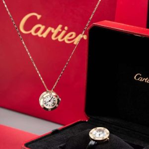 Cartier Love watch and pendant set for women with black leather strap and gold chain