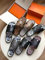 A collection of Hermès sandals, including the iconic Oran and the modern Chypre slides in a variety of patterns and colors.
