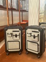 Vintage-Style Multi-Pocket Rolling Luggage