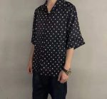 Men's black short sleeve shirt with a stylish printed pattern