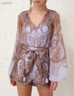 Elegant Floral Print Romper with Bell Sleeves