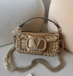 Embellished sequin designer shoulder bags with statement logo and chain strap in multiple colors