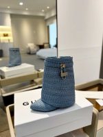 Luxury Black Ankle Boots with Metallic Lock Accent - Image 13